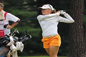 Maddie Mccrary swinging on fairway